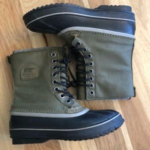 Like new. Worn once outside. No stains, tears or odors. Insulated/waterproof